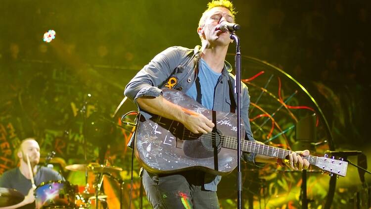 Coldplay and Chris Martin performing live in London