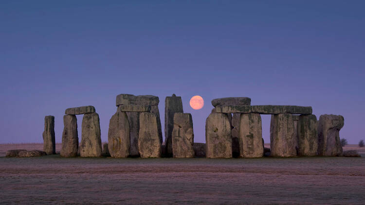 Moon in between Stonehenge in England