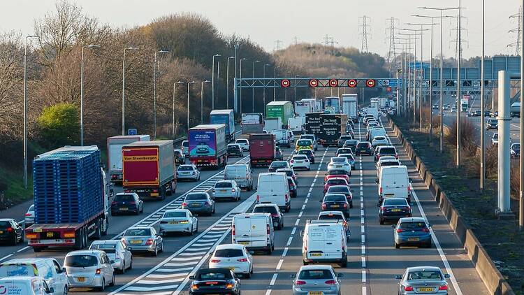 Traffic and queues of cars on the M25 motorway in England