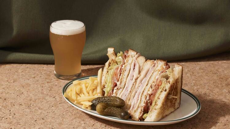 Club sandwich and beer