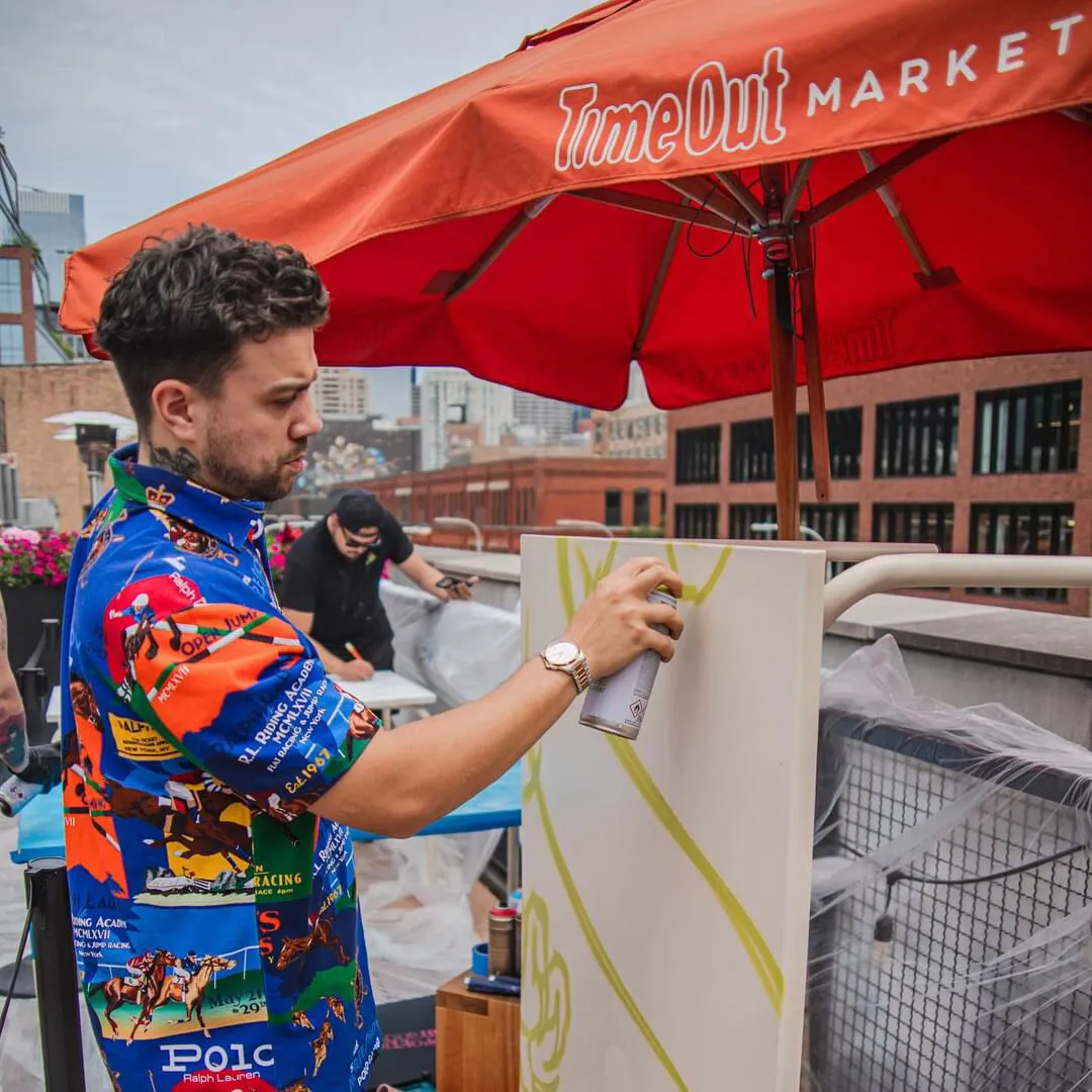 A person painting a table