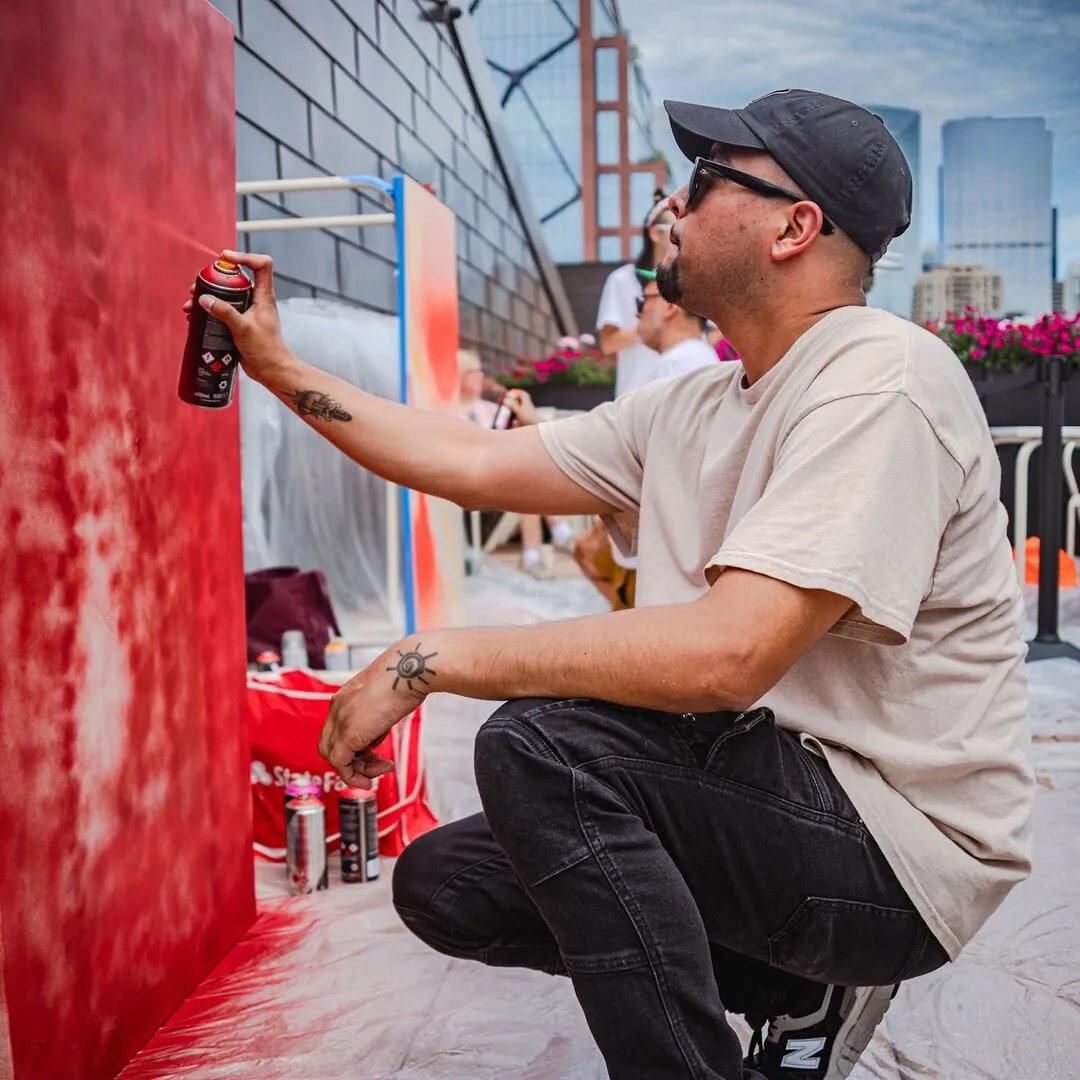 A person painting a table