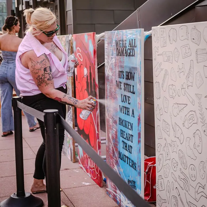 a person painting a table
