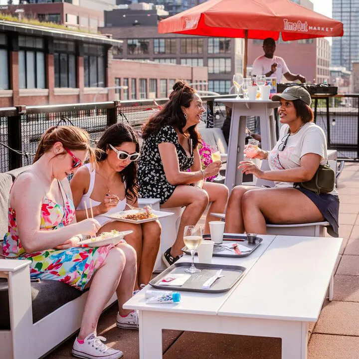 people eating on a rooftop
