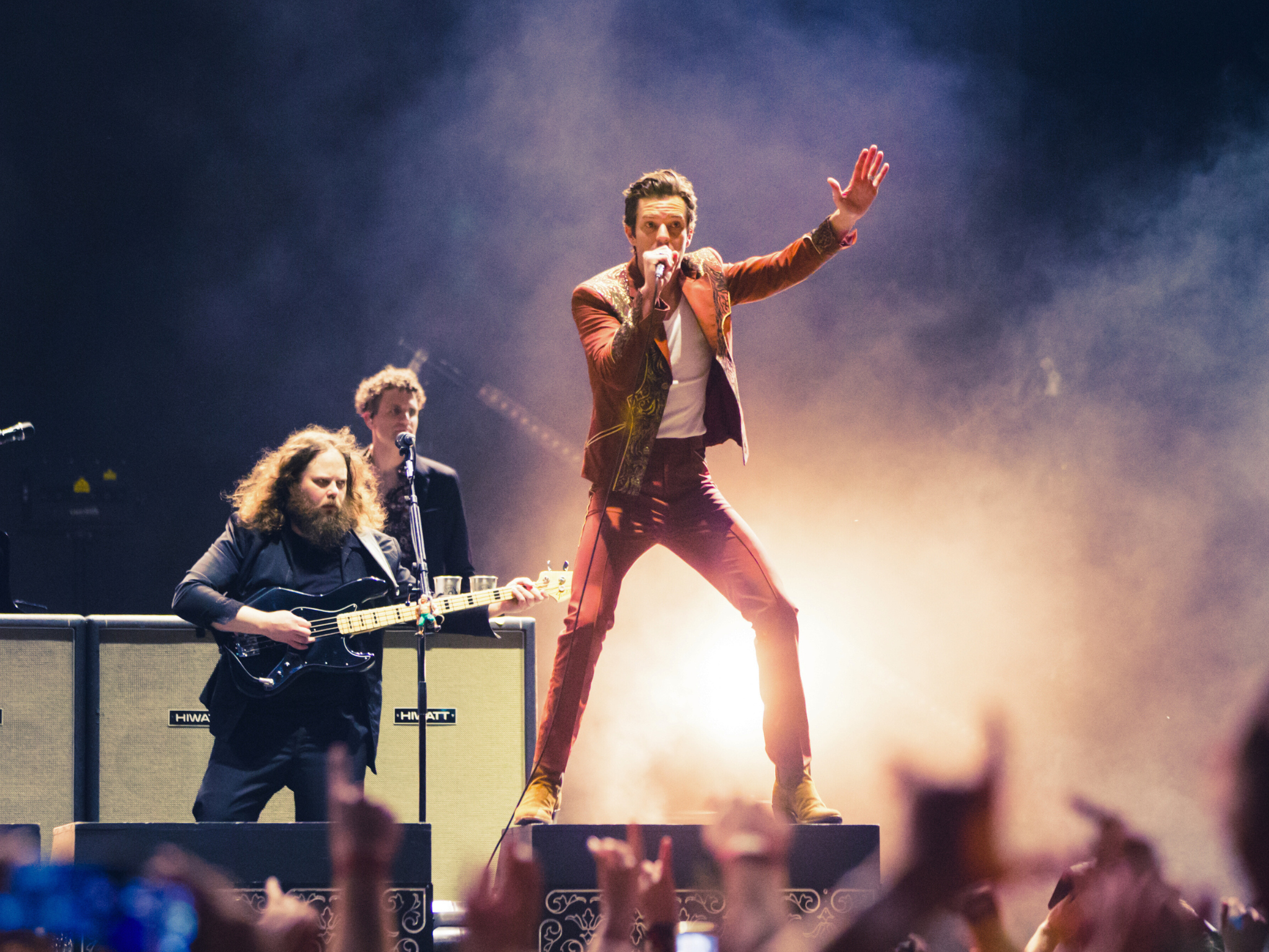 ¿Quiénes son los integrantes de The Killers y por qué son una de las bandas más icónicas del rock?