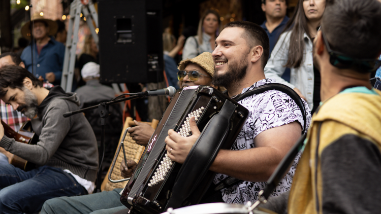 Outdoor music during Arraiá at 100th Street