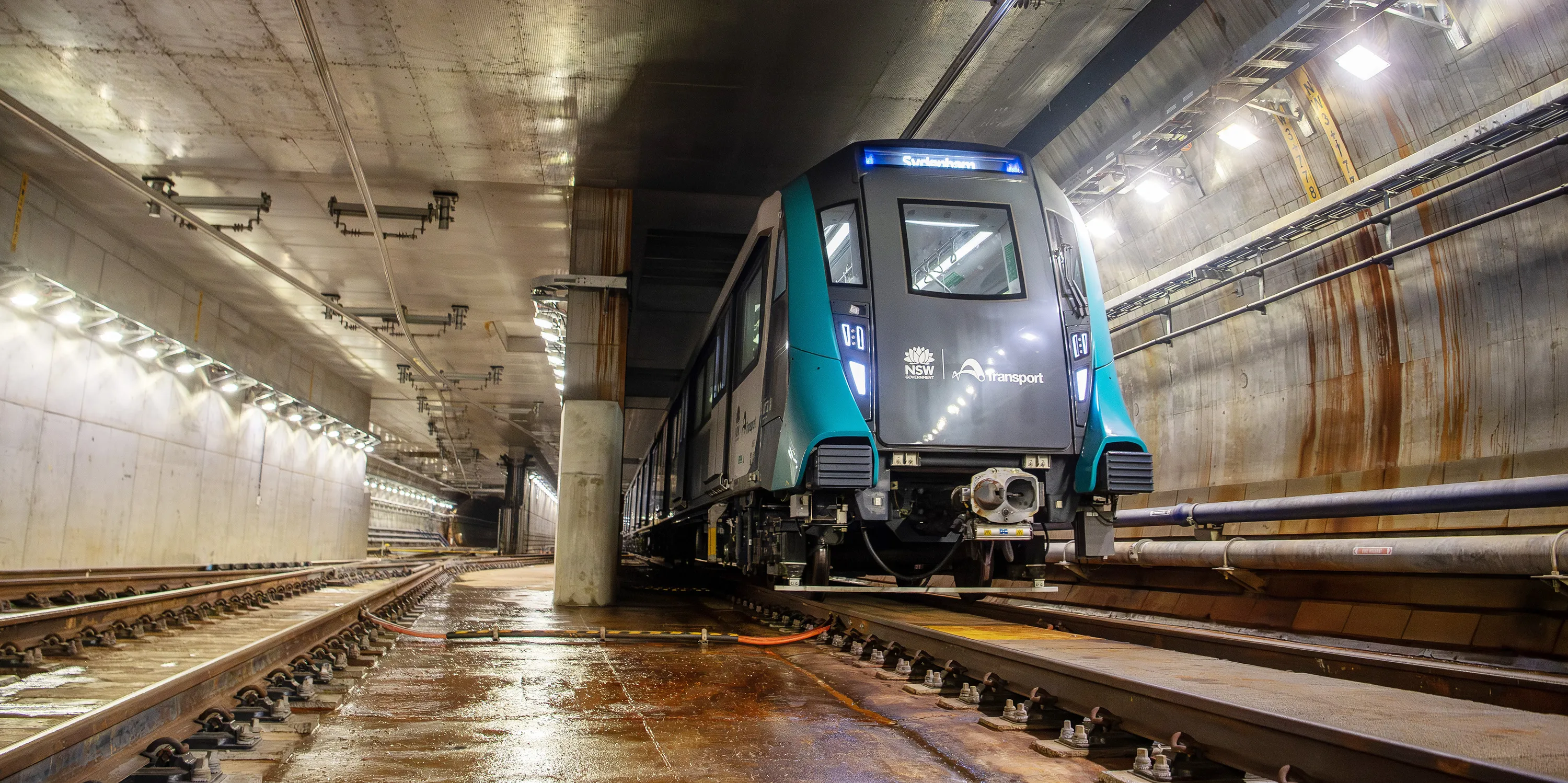 Sydney Metro City and Southwest train TS5 travels through the crossover cavern just north of Barangaroo station during testing.
