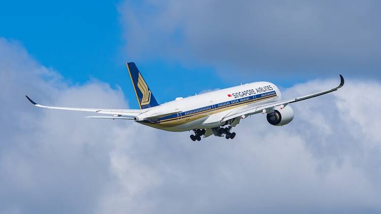 Singapore Airlines plane taking off from Amsterdam, Netherlands