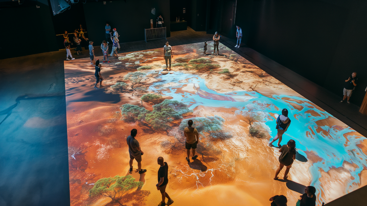 People standing on a projected floor