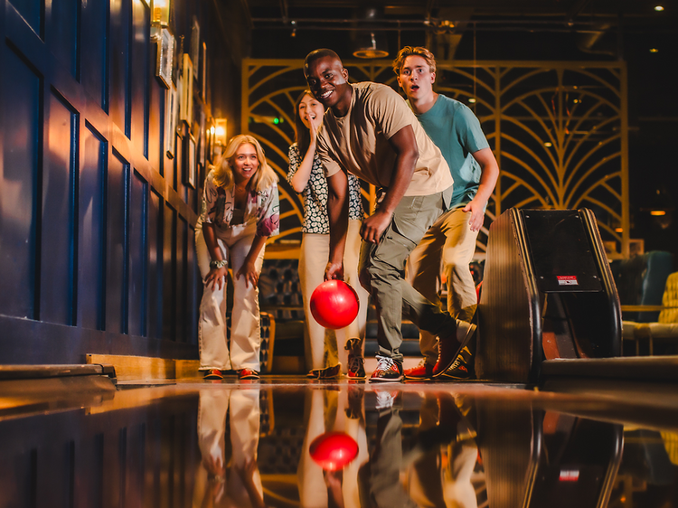 Prepare for a fun-packed night out with bowling, drinks, bottomless pizza and karaoke at All Star Lanes