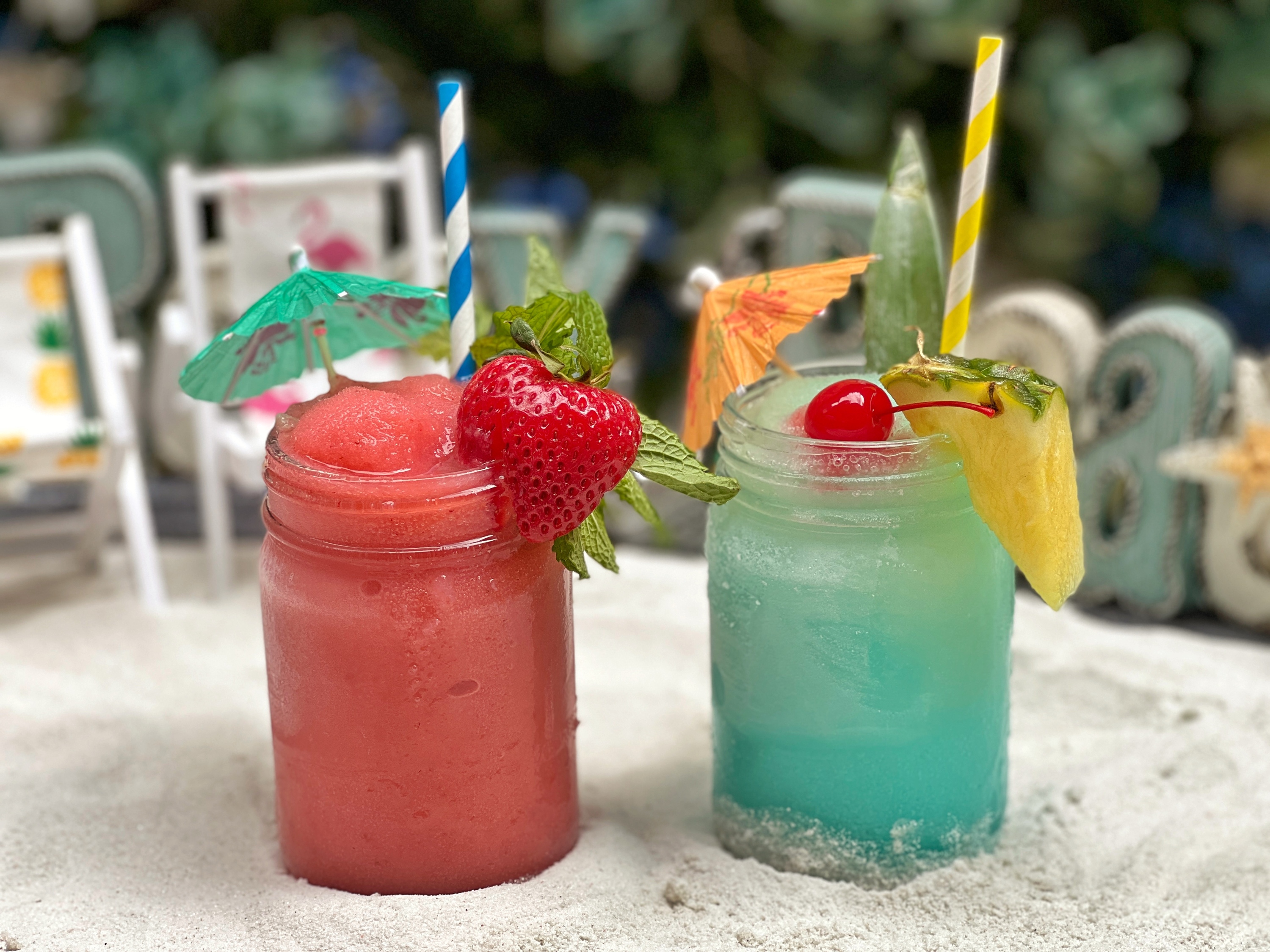 Drink frozens out of flamingo floats at Margarita Beach Club