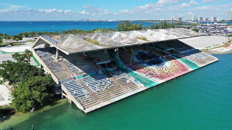 Miami Marine Stadium designed by Hilario Candela on Virginia Key with Miami skyline and Rickenbacker Causeway in background