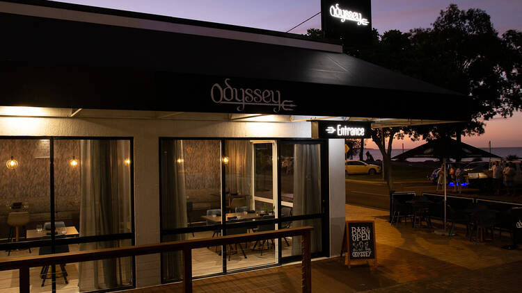 Odyssey Bistro exterior at dawn