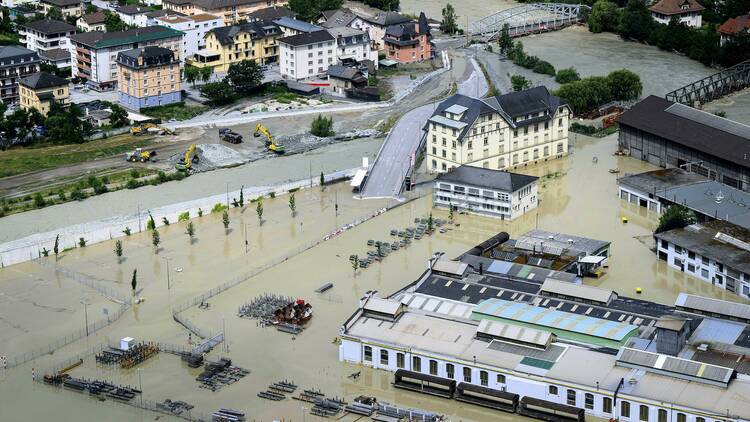 A view of the Rhone river, at right, and the Navizence river, following the storms that caused major flooding, in Chippis, Switzerland, Sunday, June 30, 2024. l