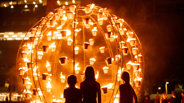 Kids watch a fire installation