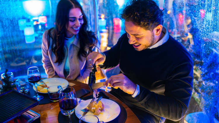 People eating raclette