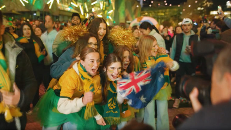 Aussie fans cheering in Fed Square.