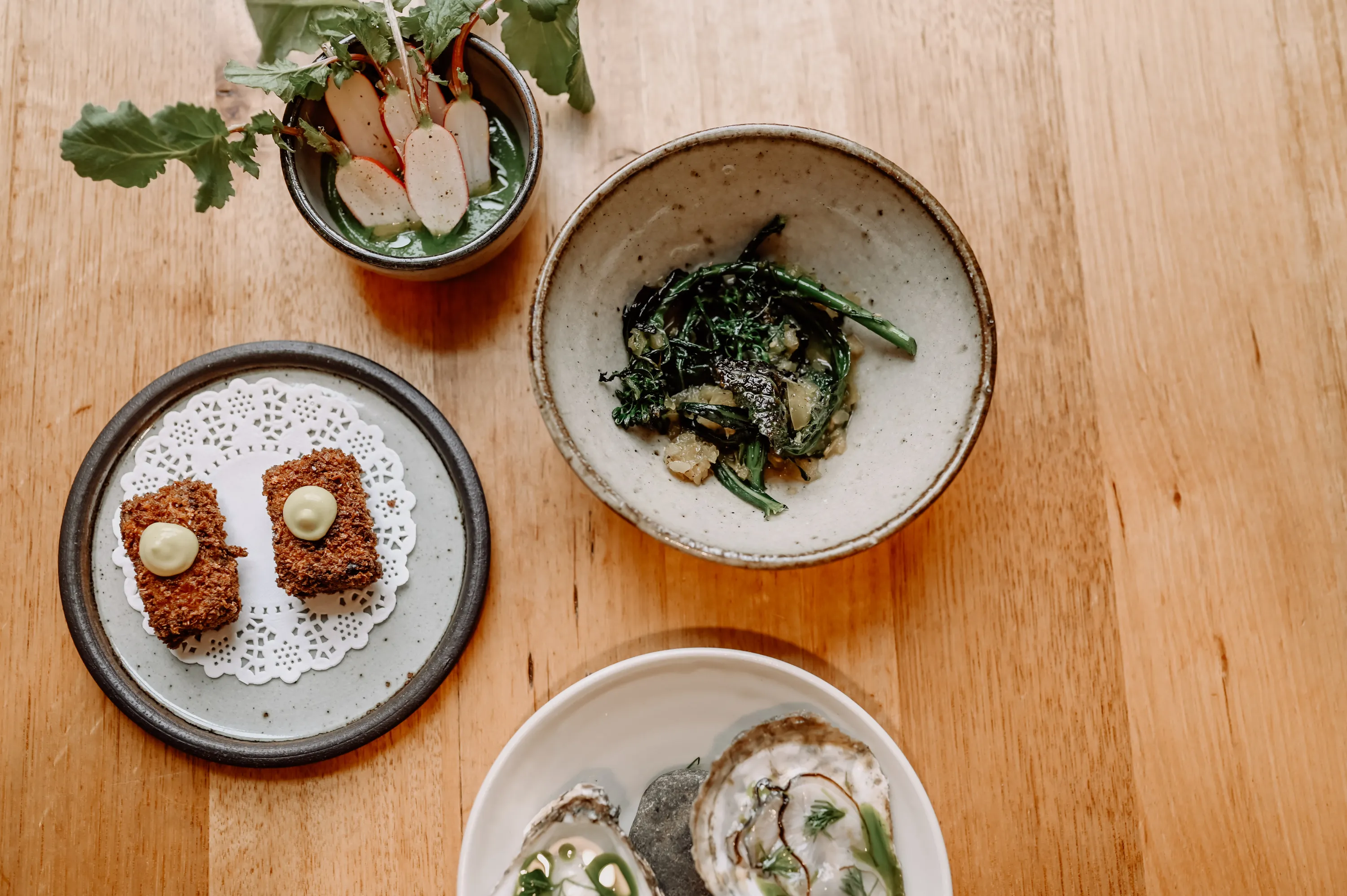 Trio of entrees at The Agrarian Kitchen