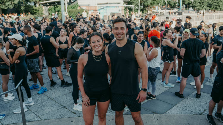 two runners posing together