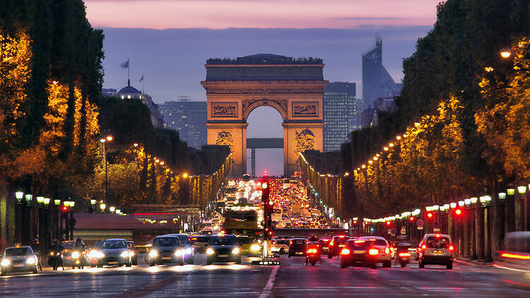 Paris Champs-Elysees at night with cars