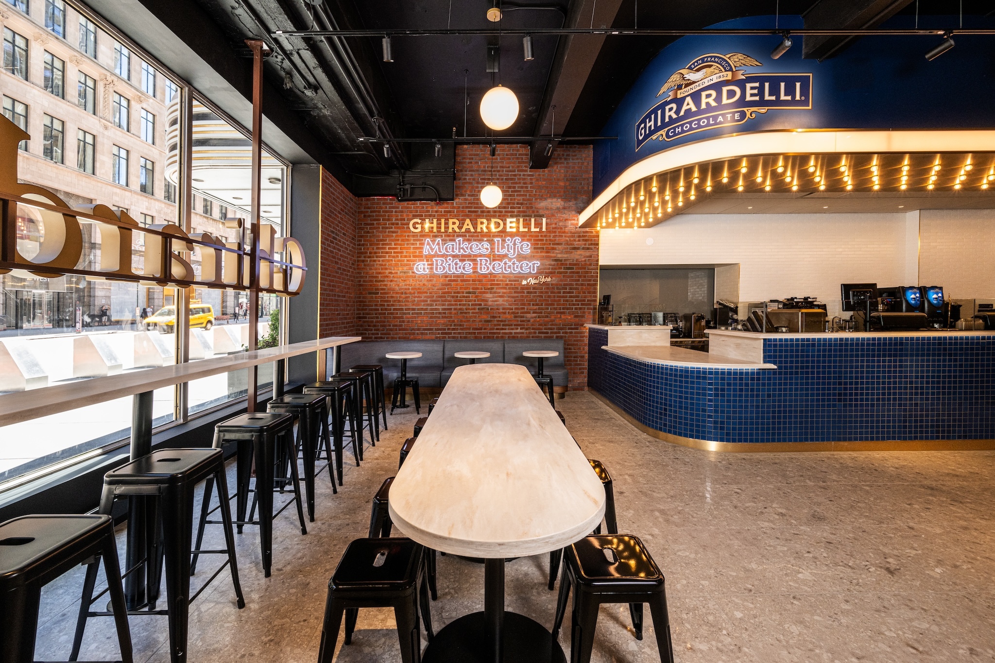 Tables inside of the Ghirardelli store.