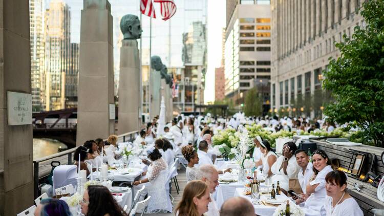 diners seated at outdoor tables