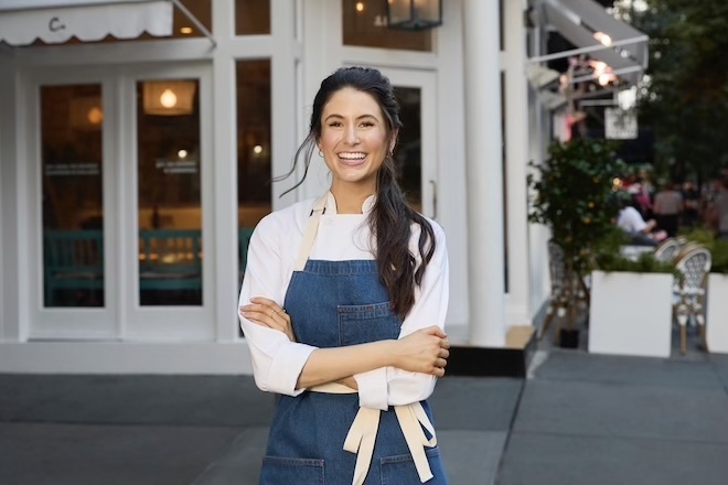 Chloe Coscarelli standing outside of her new restaurant