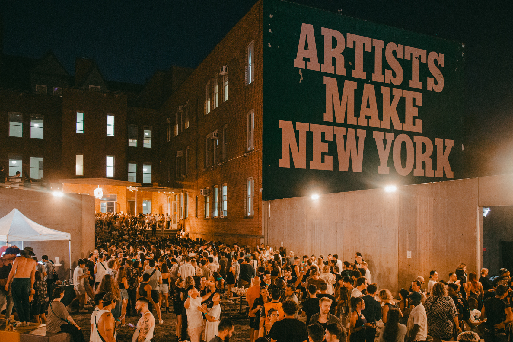 Crowd of people in a courtyard