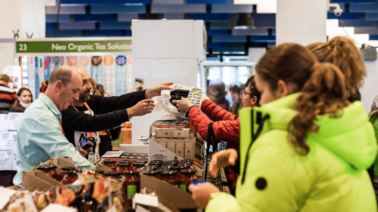 People buying things at the Gluten-Free Expo