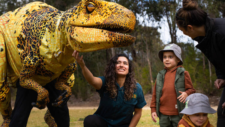 Kids meeting a life size dinosaur