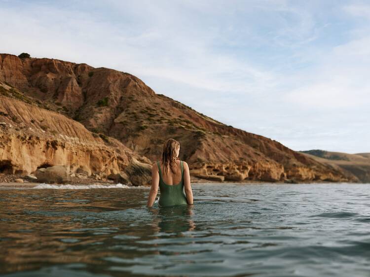 Woman swimming at Sellicks Beach