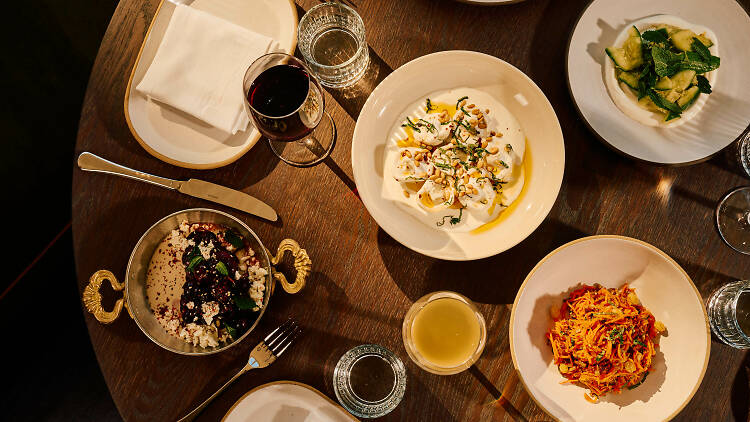 An overhead shot of dishes at Huda in Williamsburg