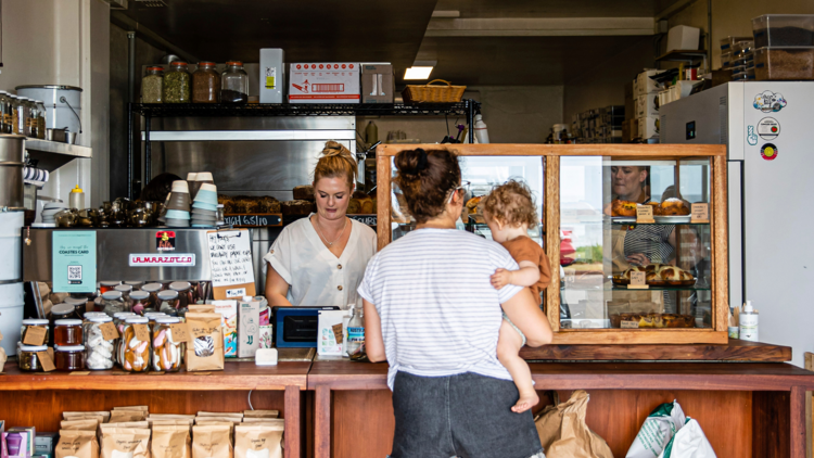 woman with child in café