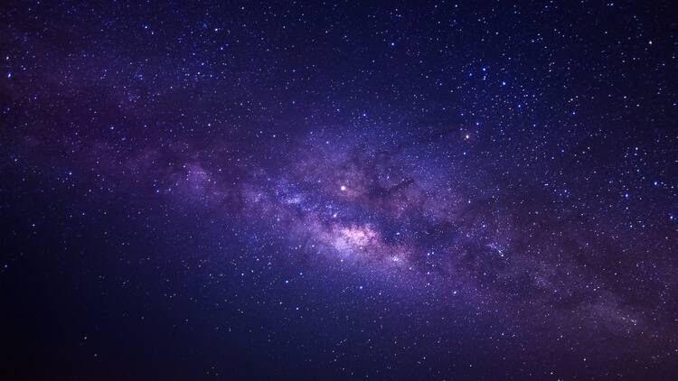 Milky way galaxy with stars and space dust in the universe, Long exposure photograph, with grain.