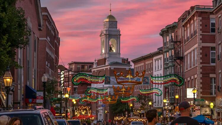 BOSTON, MA - 12 AUGUST 2022: Hanover Street in the North End decorated for Italian feast and festival season.