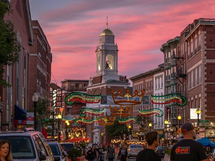 BOSTON, MA - 12 AUGUST 2022: Hanover Street in the North End decorated for Italian feast and festival season.