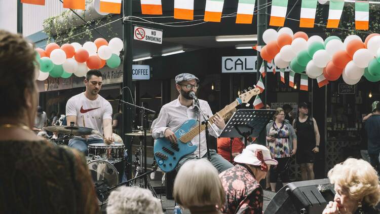 A musician performing at Preston Market's Italian Day.