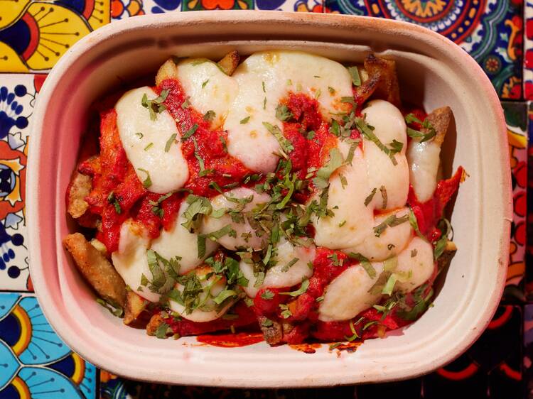 Tandoori Chicken Poutine from eet at Disney Springs