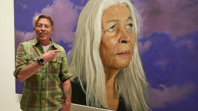 People's Choice winner Angus McDonald with his portrait ‘Professor Marcia Langton AO’