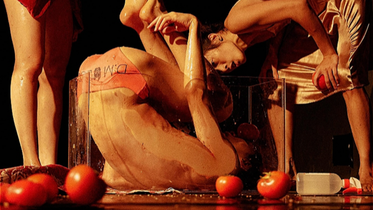 Performers with tomatoes