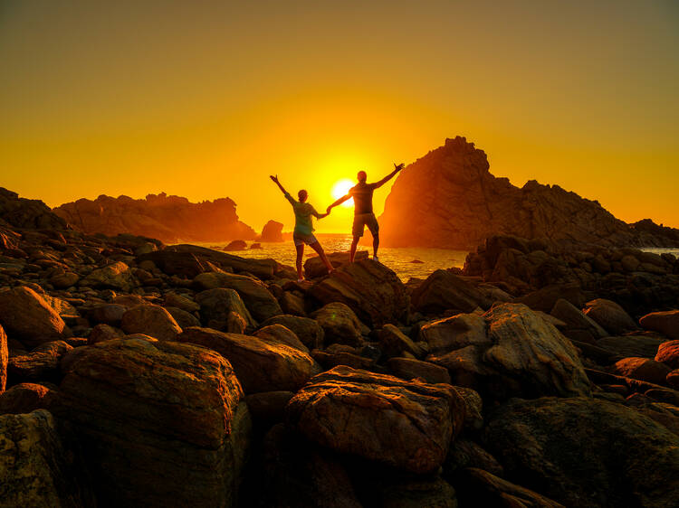 Watch the sunset at Sugarloaf Rock