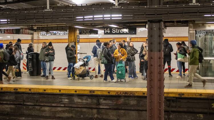 people on a subway platform