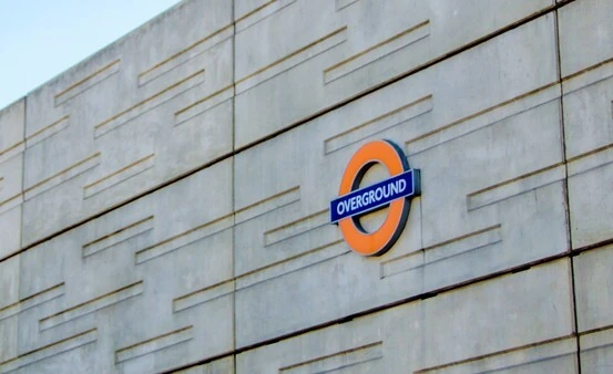 London Overground sign on the outside of a train station
