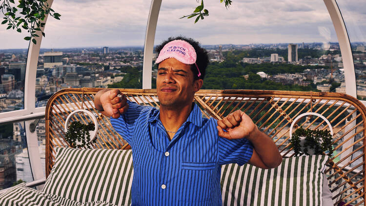 A man yawning on the London eye 