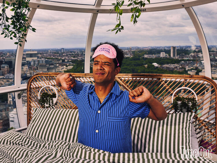 A man yawning on the London eye 