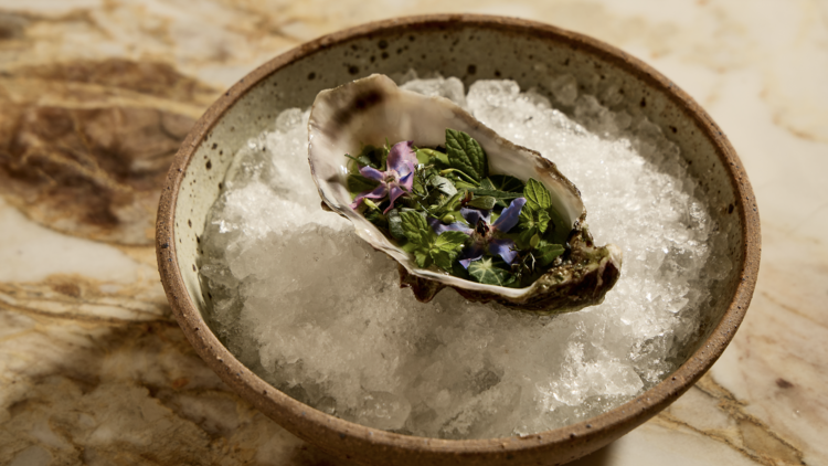 Oyster topped with natives