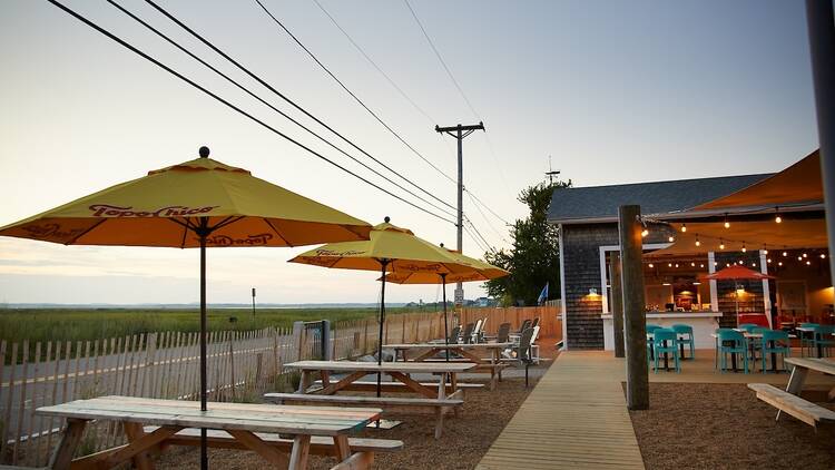 Sunset Club picnic tables view