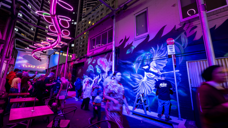 A neon lit laneway