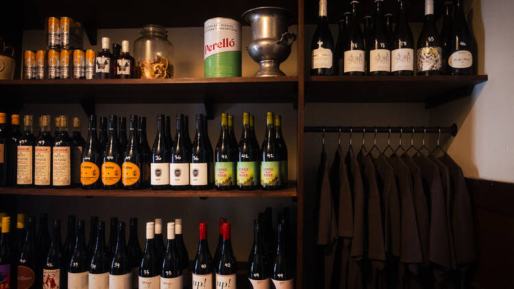 Wines on bottle shop walls.