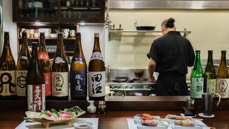 Appreciate local sake and sashimi at Itoguchi